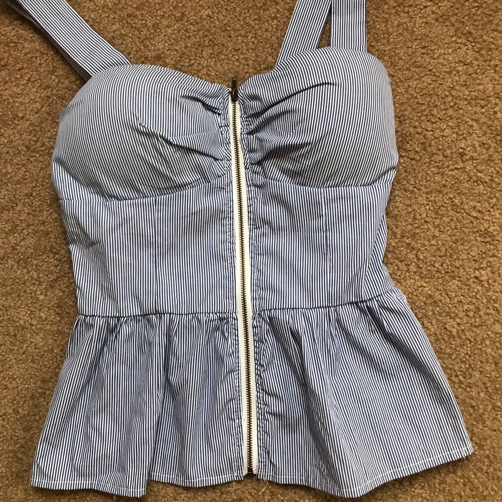 Blue and white pinstripe blouse with zipper.
